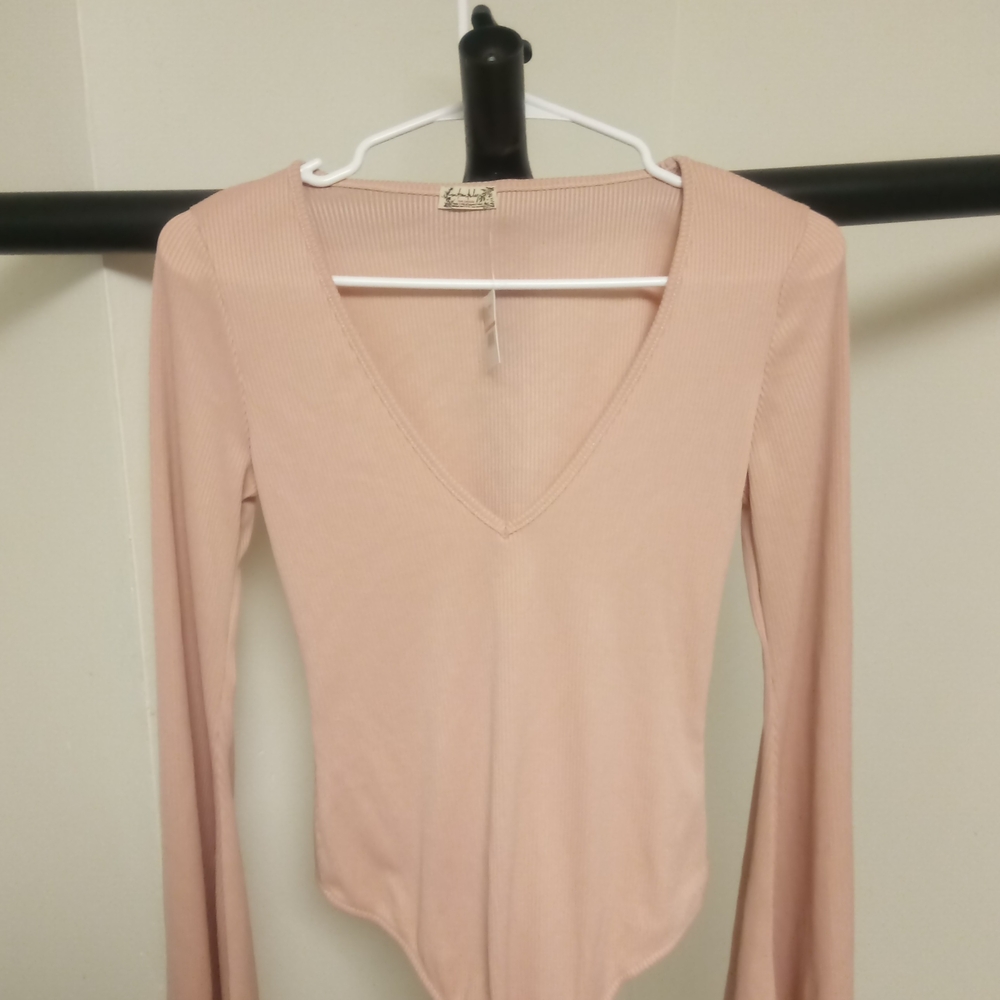 Free People V-Neck Long Sleeve Bodysuit in Light Pink